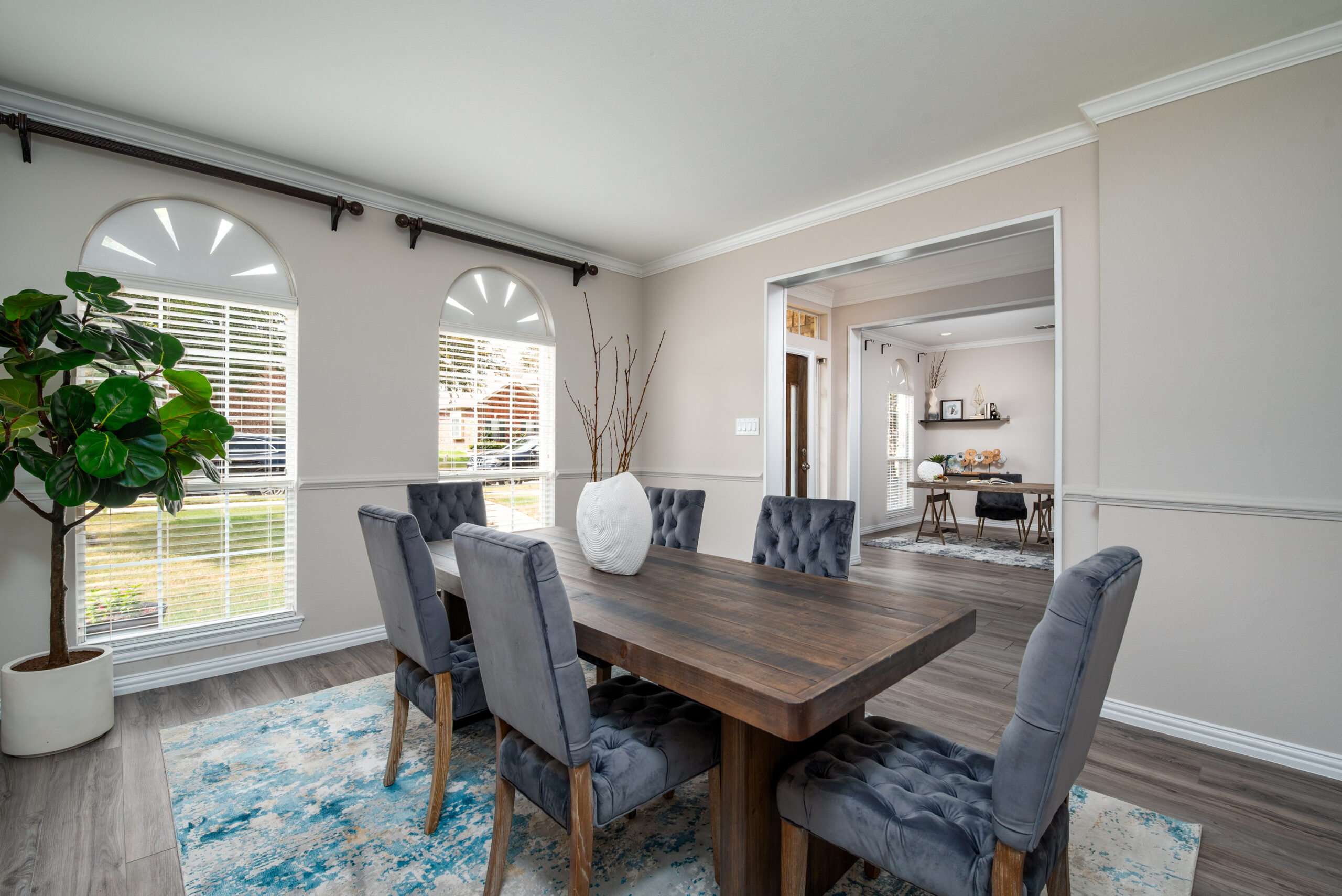 Luxury living room with blue ottoman